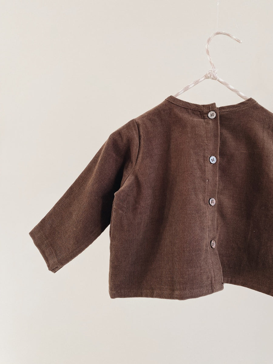 <tc>Jacob top brown</tc>