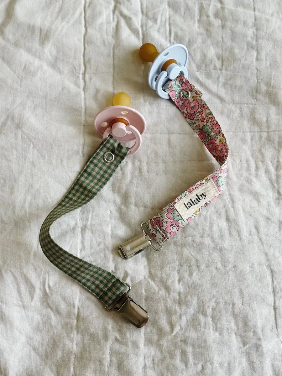 Pacifier clip green check