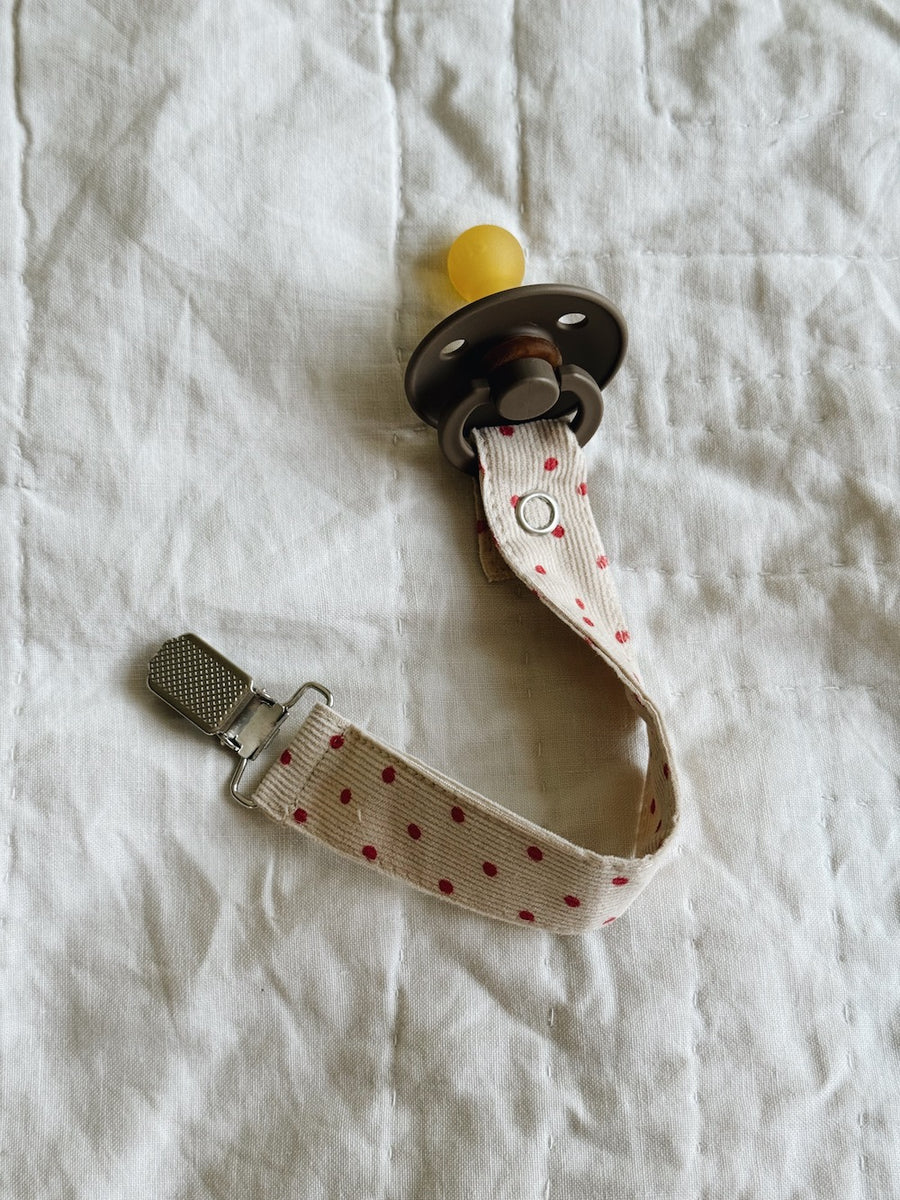 Pacifier clip red dot